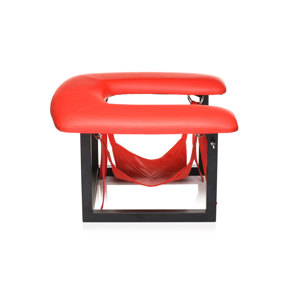 Red vegan leather queening chair with head sling and black metal frame.