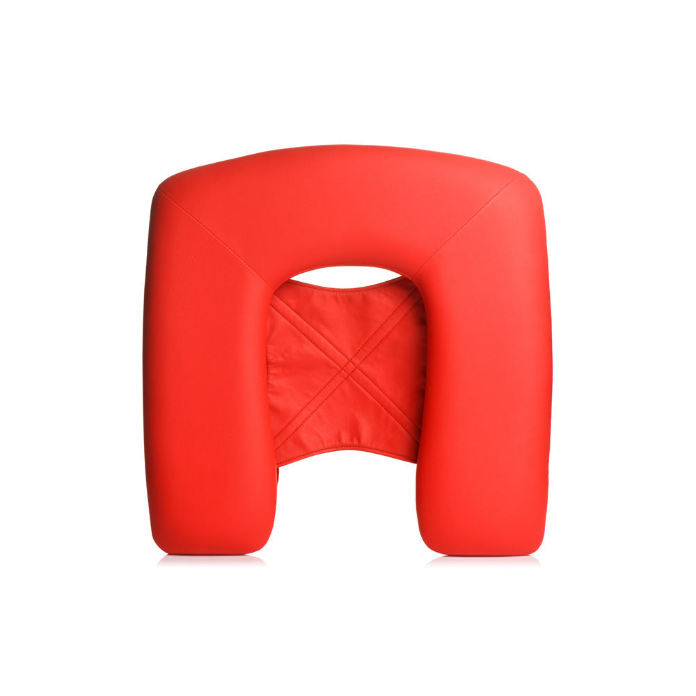 Red vegan leather queening chair with head sling and padded seat.
