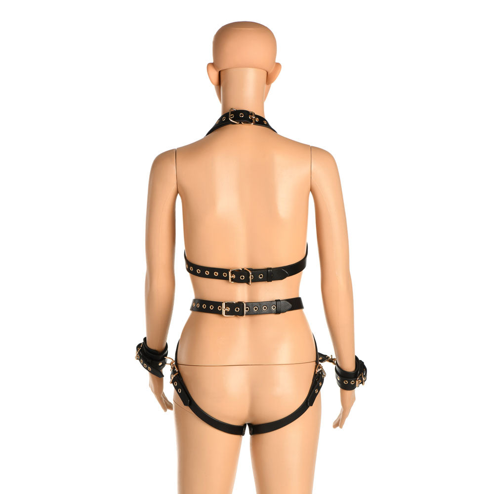 Vegan leather full body harness with cuffs and restraints.