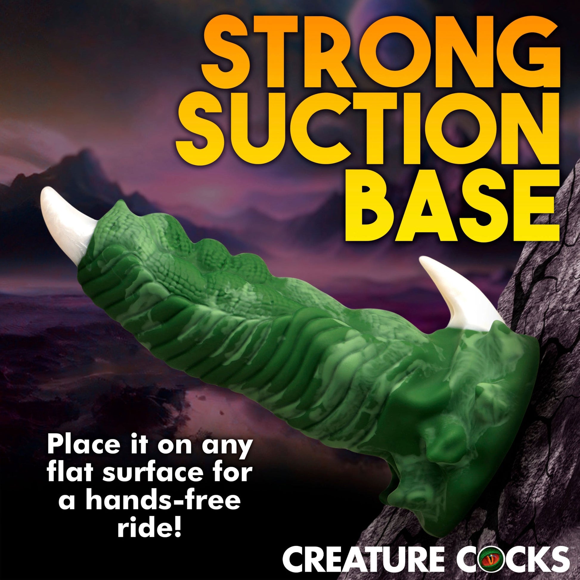 Green dragon claw dildo with white talon and suction cup base.