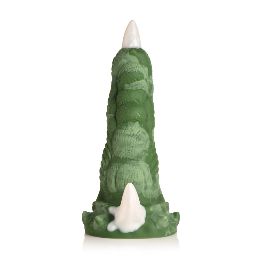 Green dragon claw dildo with white talon and suction cup base.