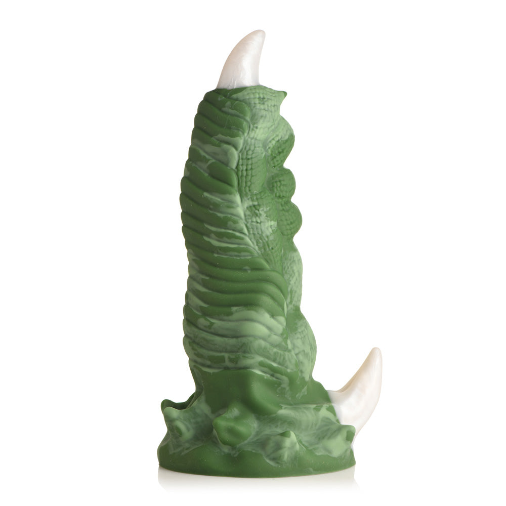 Green dragon claw dildo with white talons and a suction cup base.