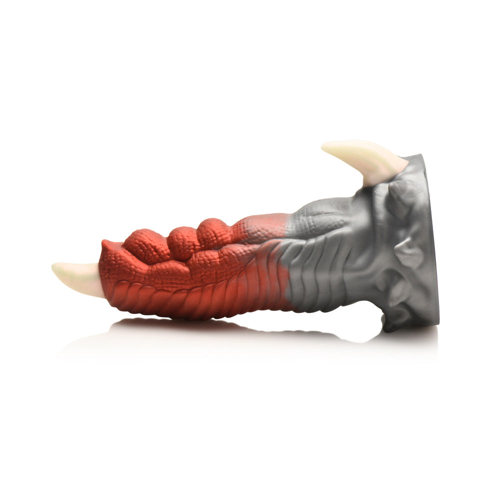 Dragon finger dildo with red scales and white horns.