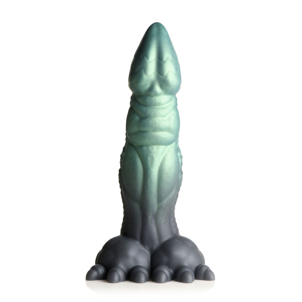 A green and black dinosaur dildo with a suction cup base.