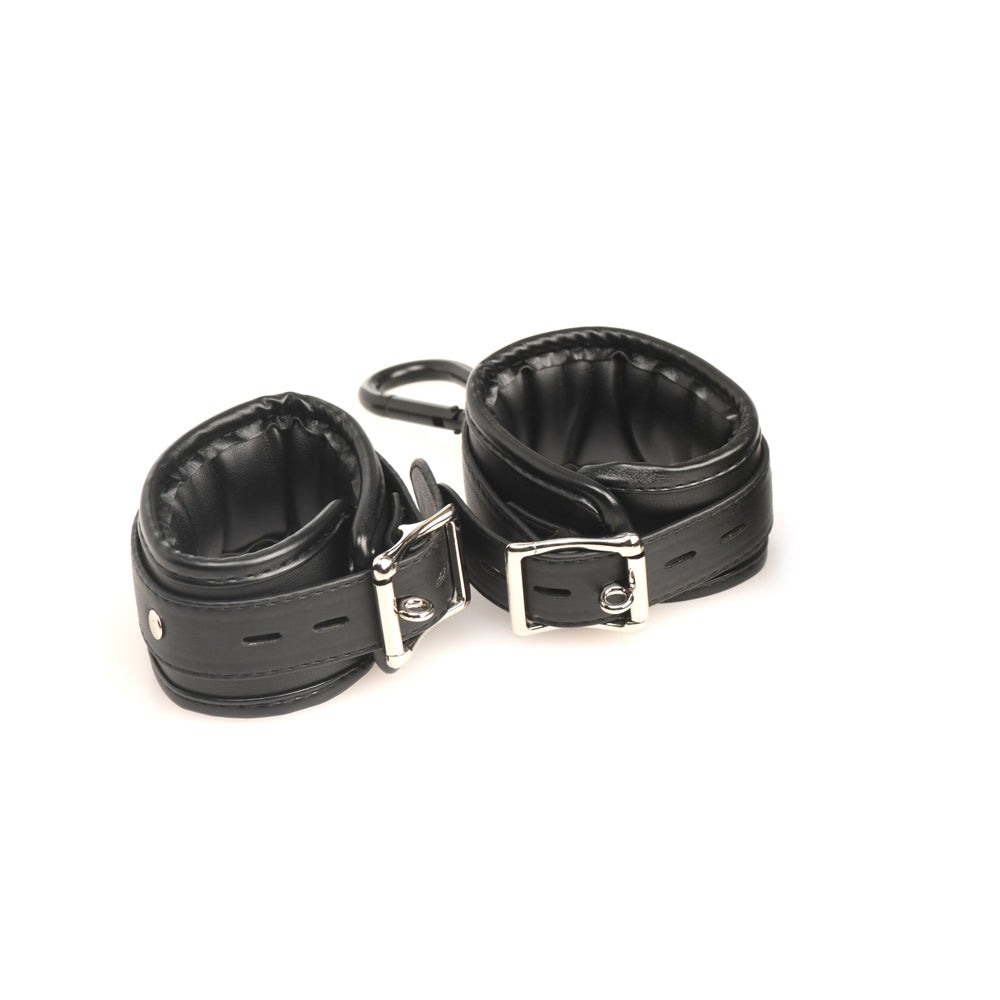 Black leather wrist cuffs with silver buckles and a connecting strap.