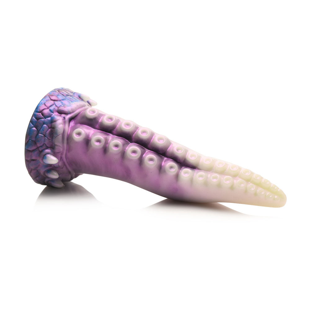 Purple and white tentacle-shaped silicone dildo with textured suckers.