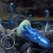 Blue silicone octopus creature keychain with tentacles and a keyring.