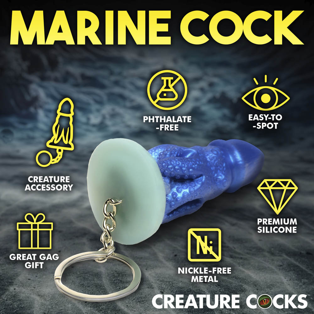 Blue silicone octopus creature keychain with text and icons.