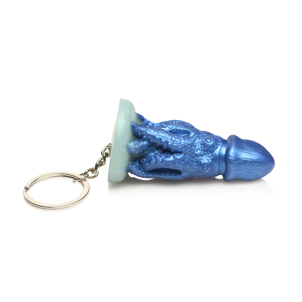 Blue silicone octopus creature keychain with tentacles and a ring.