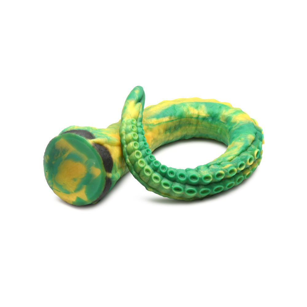 Green and yellow silicone dildo with tentacle-like texture and suction cup base.