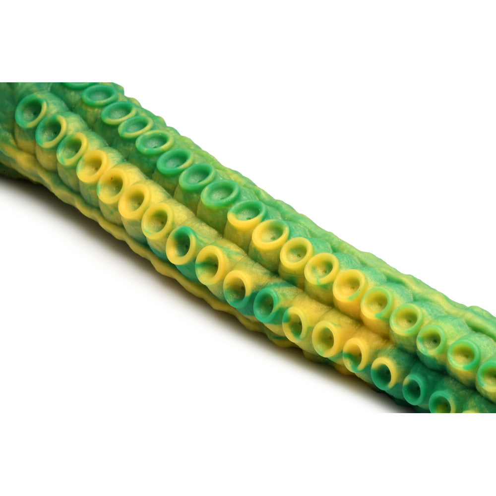 Green and yellow textured silicone tentacle dildo with suckers.