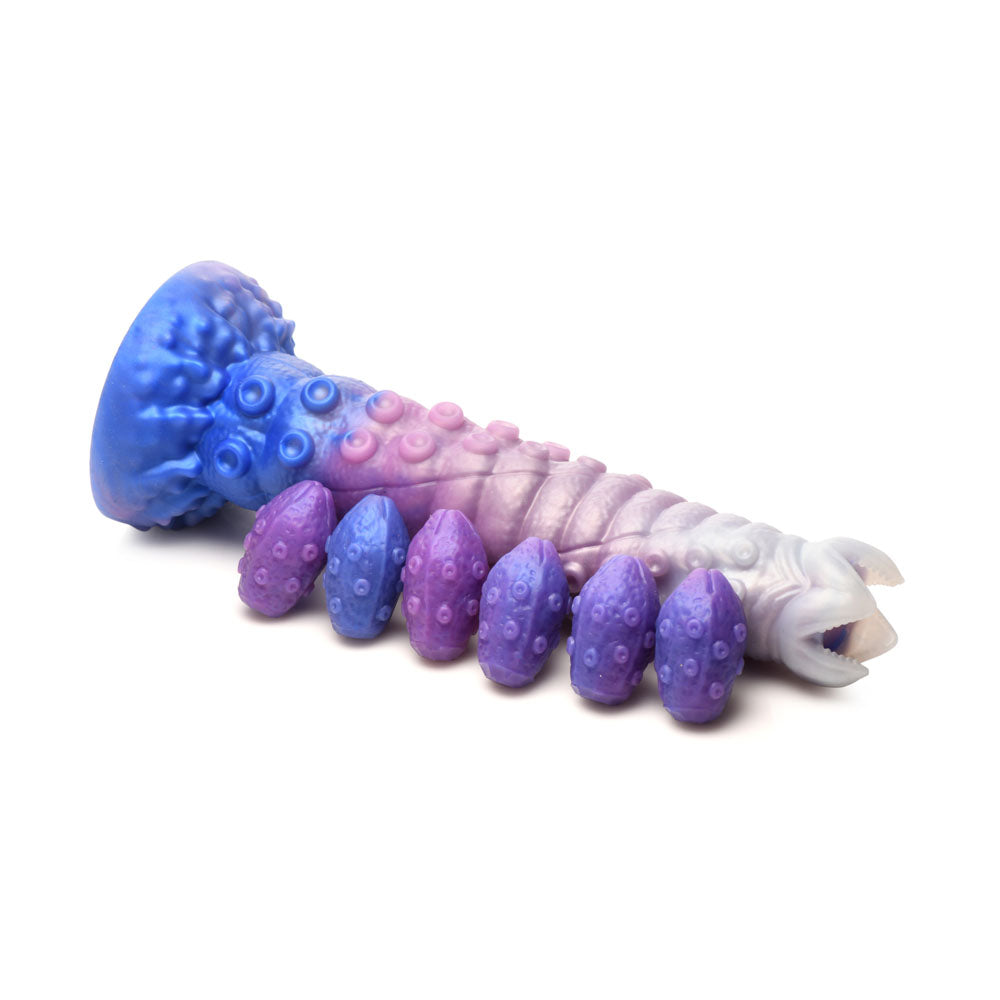 A large, blue and pink tentacle dildo with six purple egg attachments.