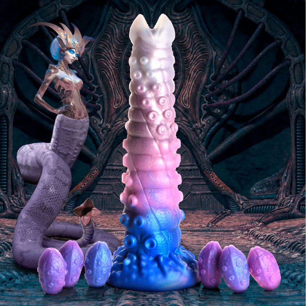 A large, tentacle-shaped dildo in pink, purple, and blue with a queen-like figure and eggs.