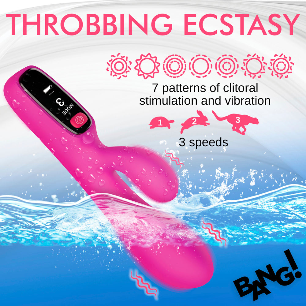 Pink digital silicone rabbit vibrator with 7 patterns and 3 speeds, partially submerged in water.