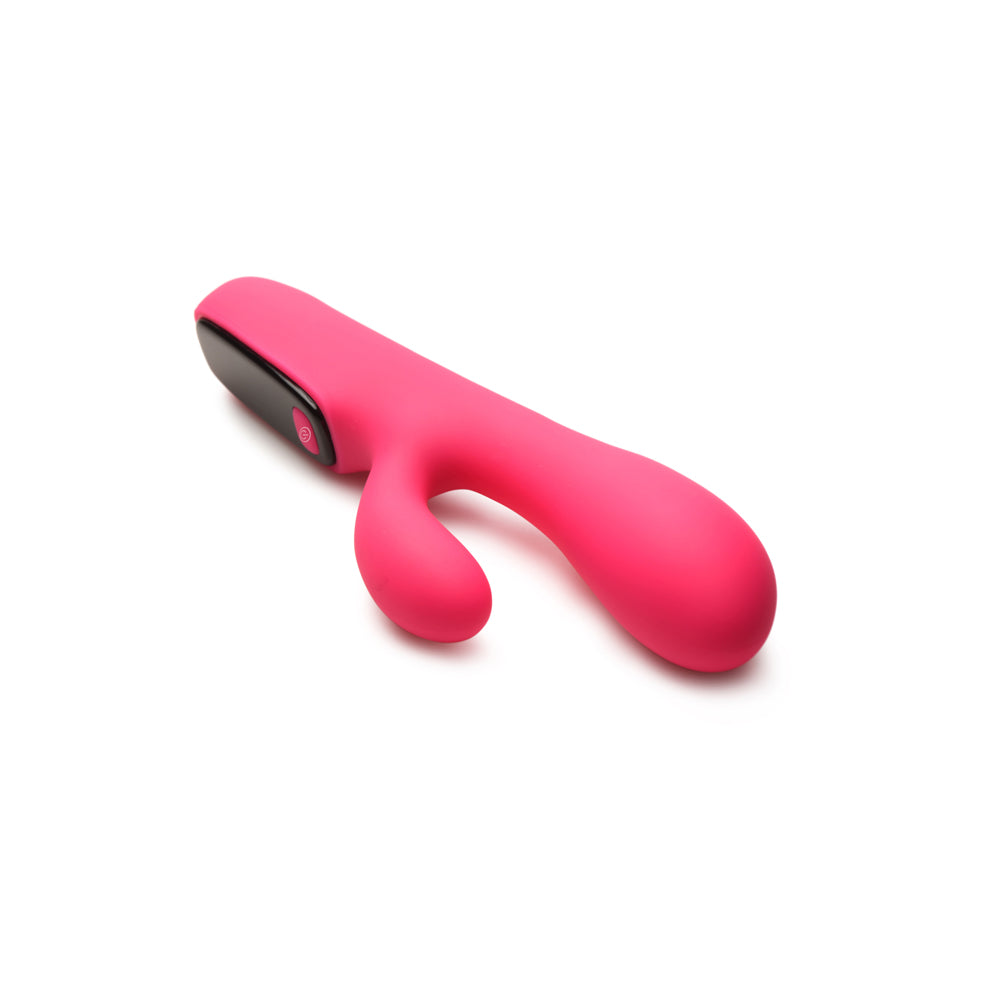 A pink silicone rabbit vibrator with a black control panel.