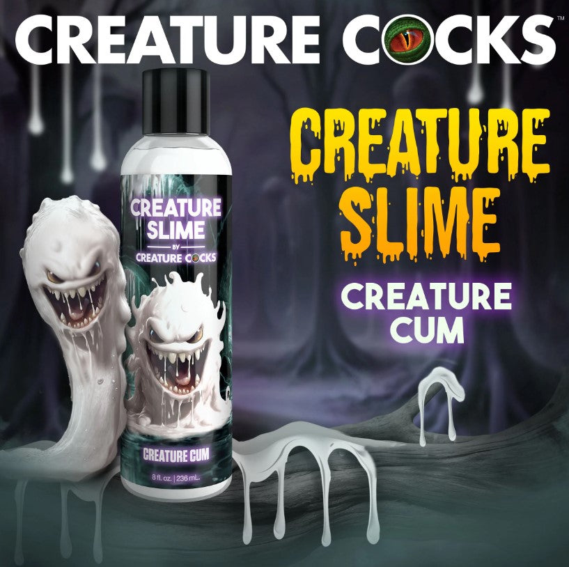 Bottle of Creature Slime by Creature Cocks with two monster figures.