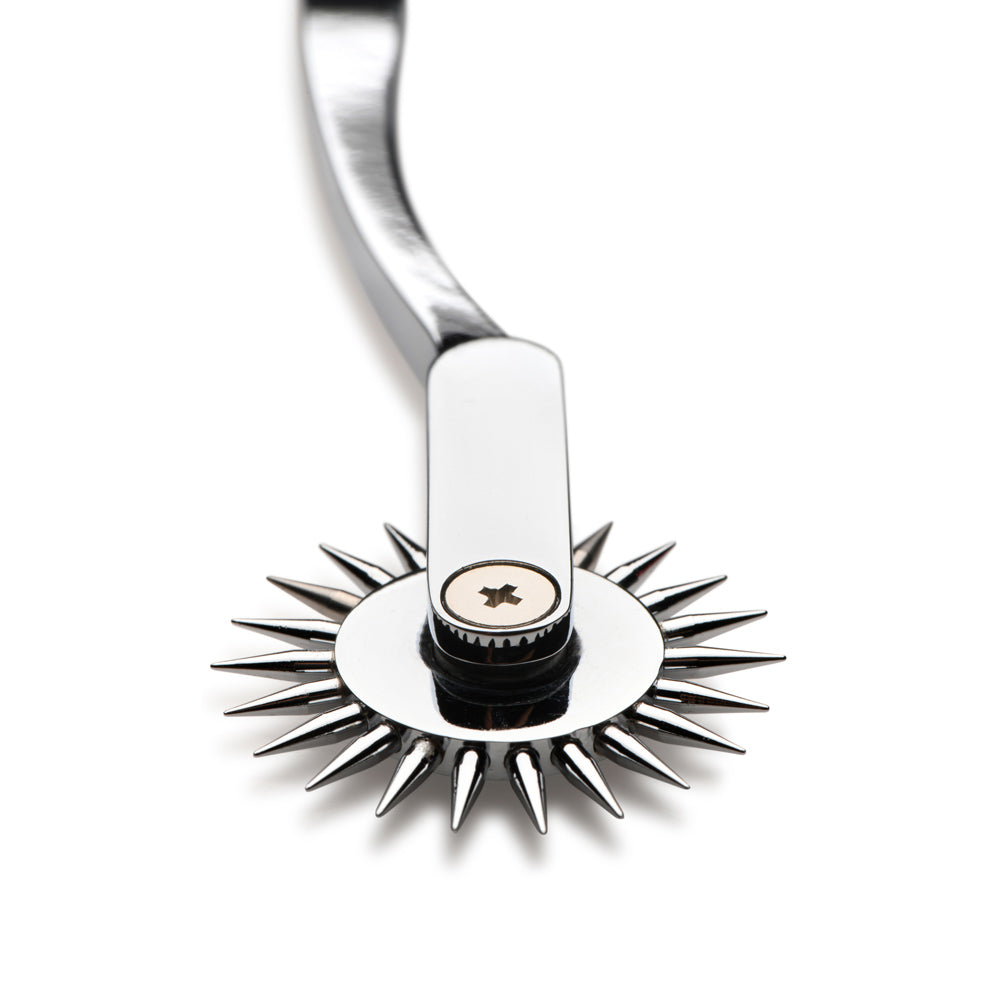 Stainless steel Wartenberg pinwheel sensation toy with a curved handle.