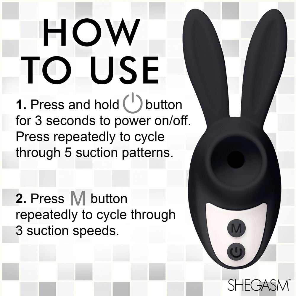 A black bunny-shaped clitoral stimulator with two buttons.