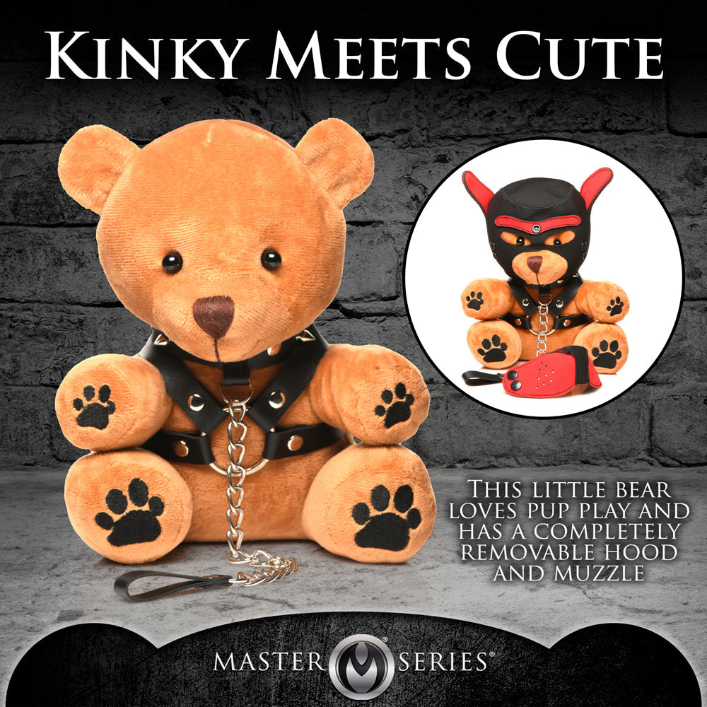 A 9-inch plush teddy bear wearing a black harness, collar, and leash.