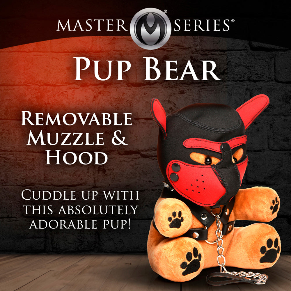 A plush teddy bear wearing a removable black and red pup hood and muzzle.