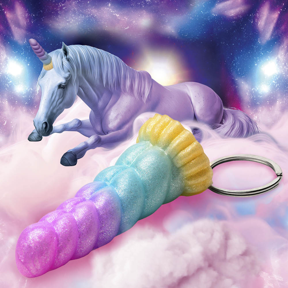 Rainbow unicorn horn keychain with glitter.