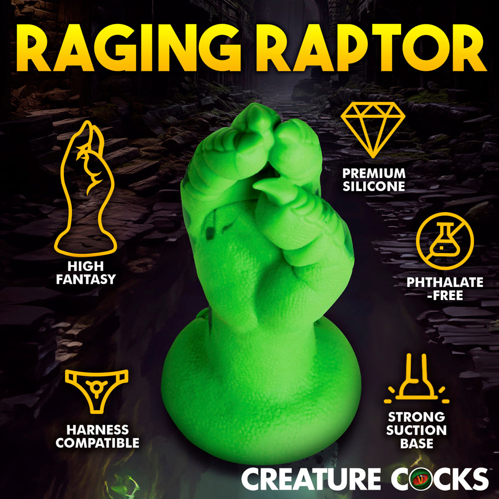 Green raptor claw silicone dildo with suction cup base.