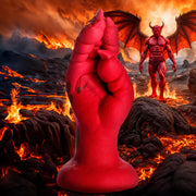 Red silicone dildo shaped like a demon's clawed hand with a suction cup base.