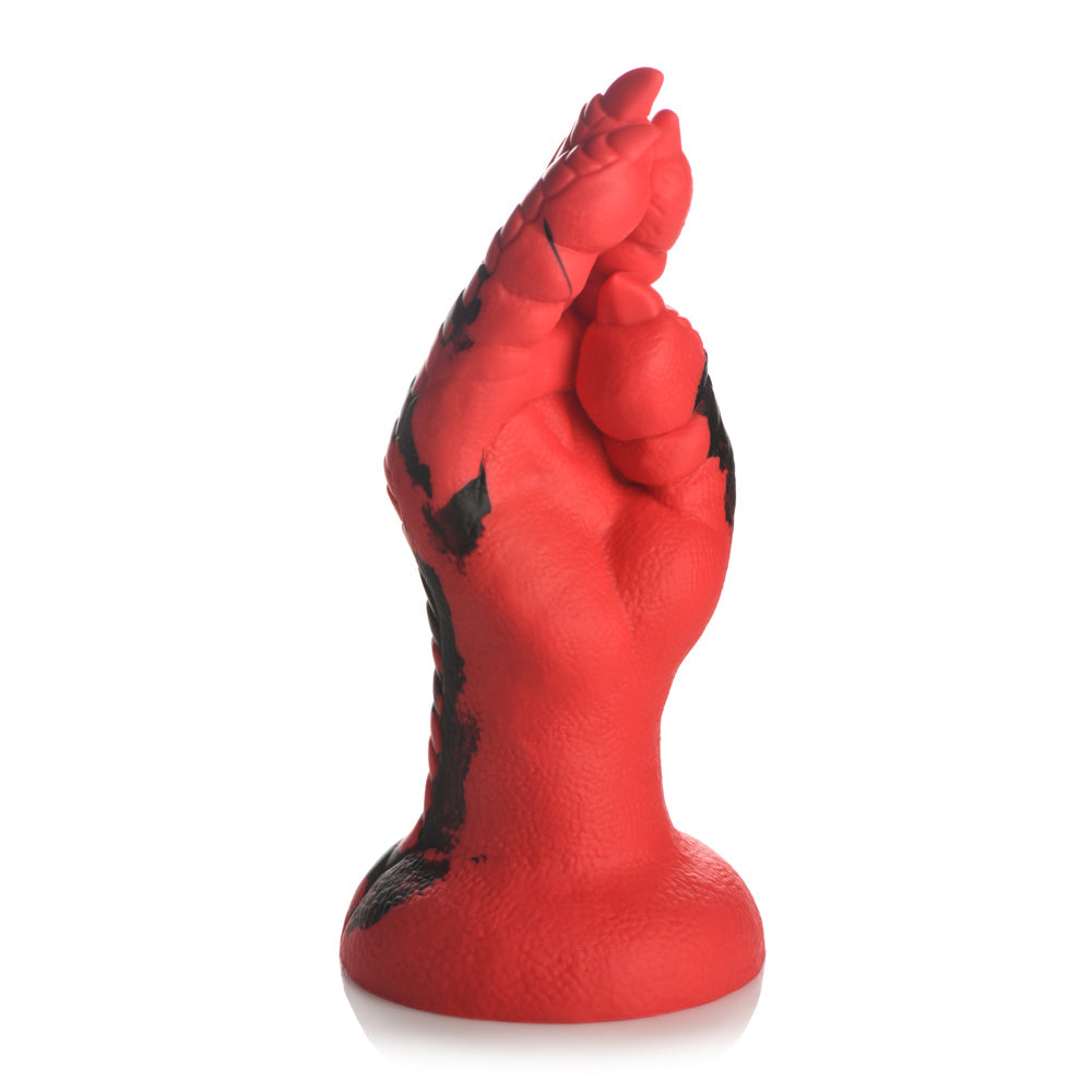 Red silicone dildo shaped like a demon's claw with black accents.