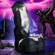 Venom-inspired silicone dildo with textured crown and spiky base.