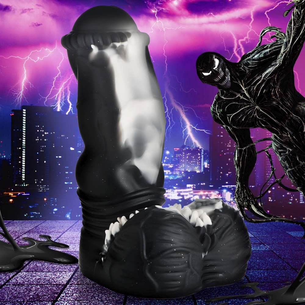 Venom-inspired silicone dildo with textured crown and spiky base.