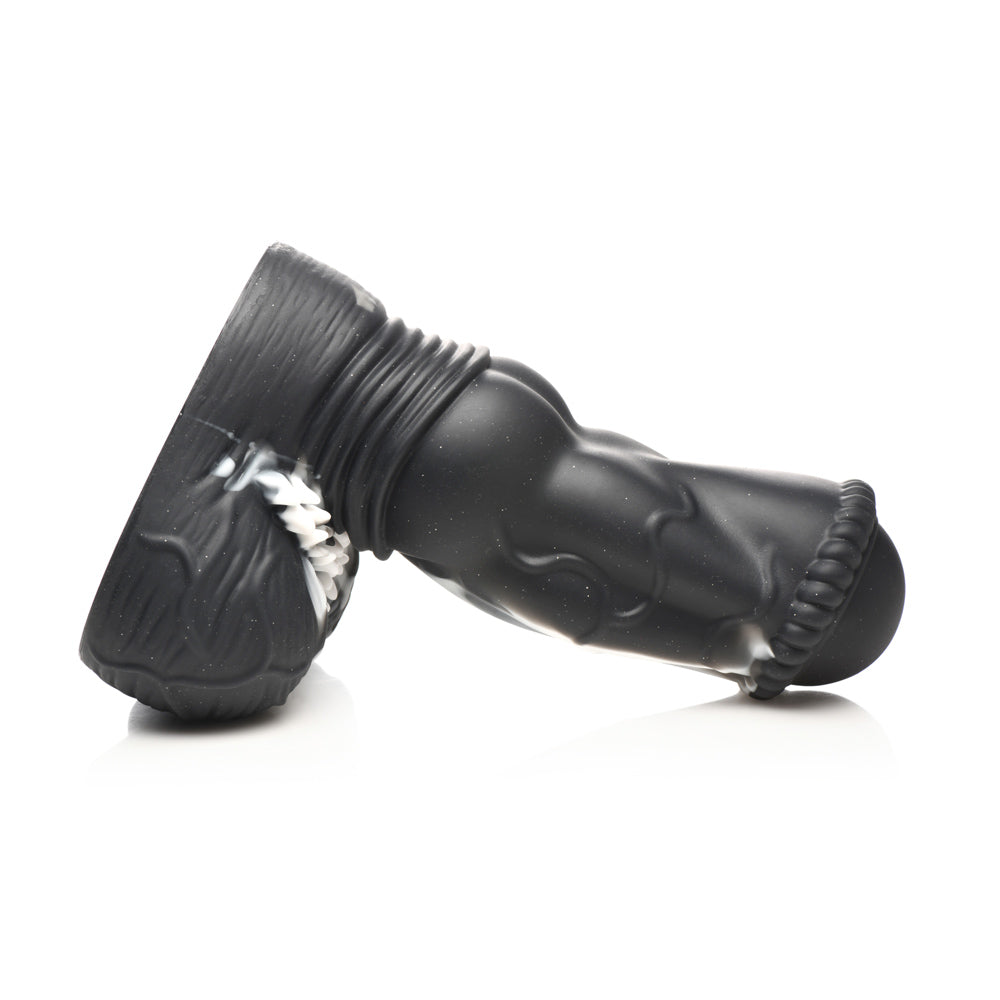 Black silicone dildo with ribbed texture and white accents.