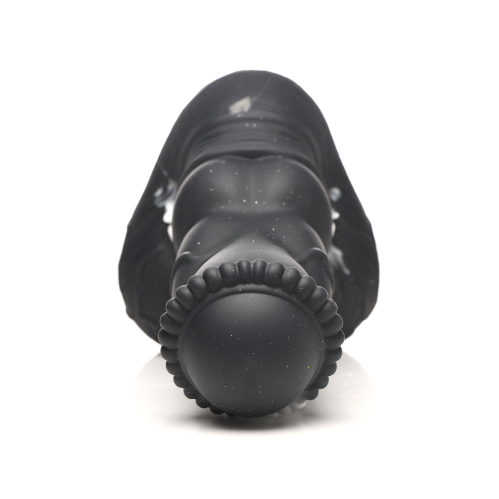 Black silicone dildo with a textured crown and suction cup base.