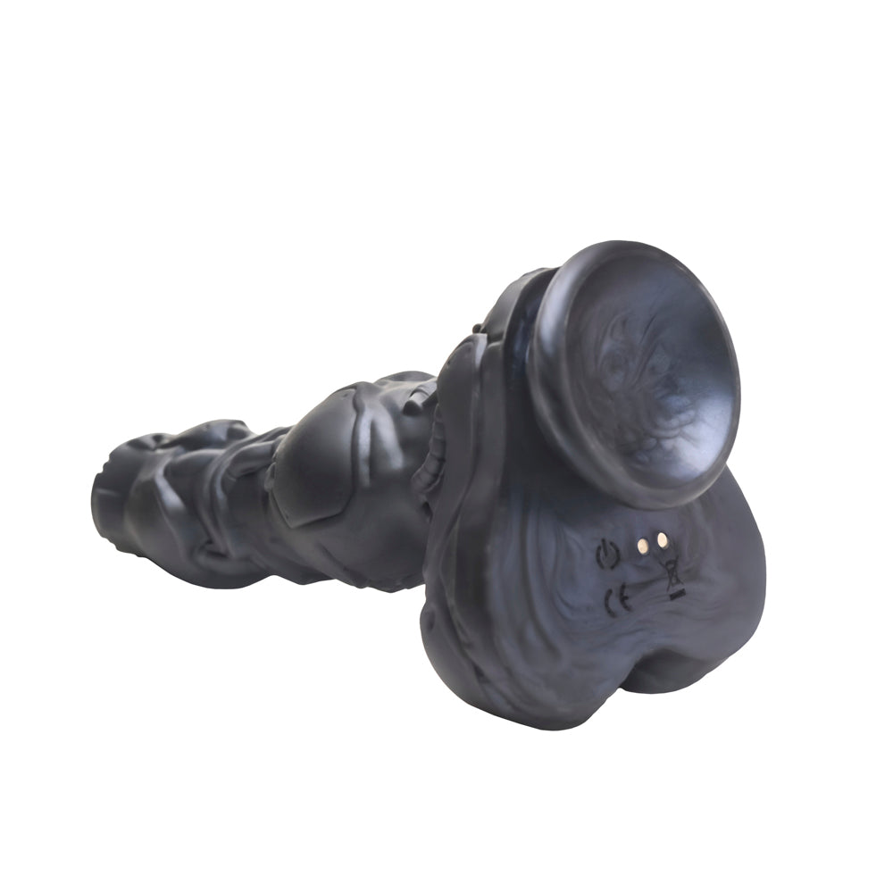 A black silicone dildo with a suction cup base and textured shaft.