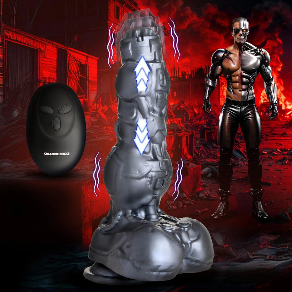 A silver cyborg-themed silicone dildo with a remote control and a male cyborg figure.