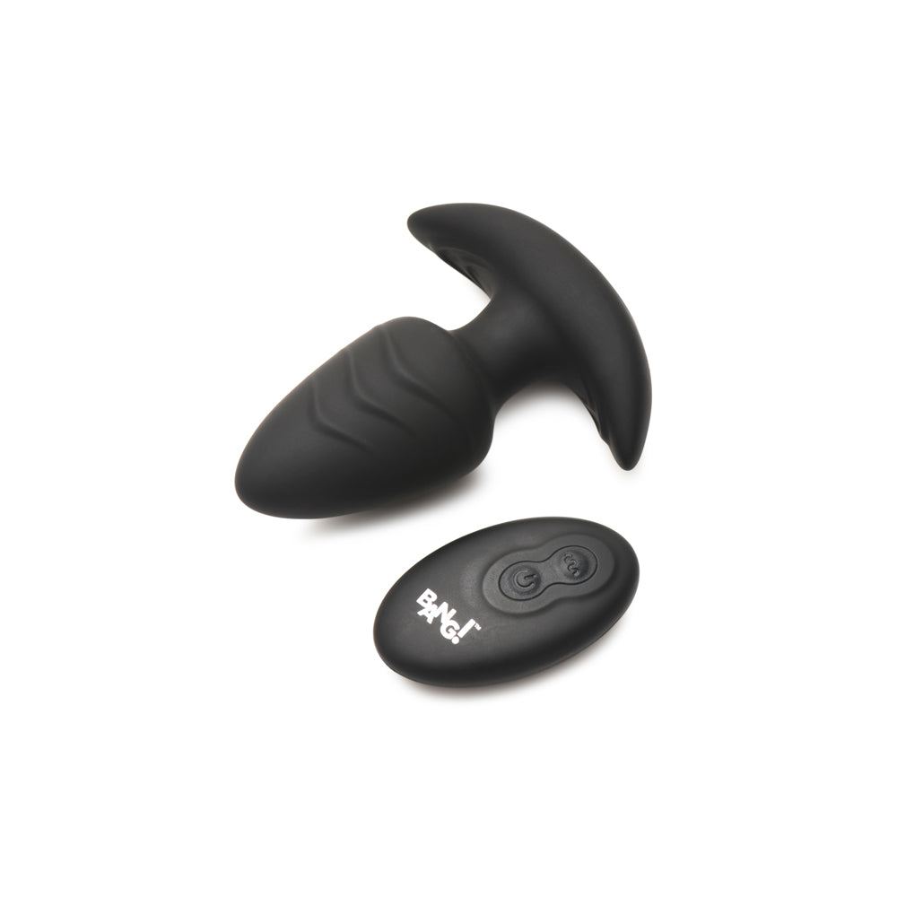 Black silicone anal plug with a remote control.