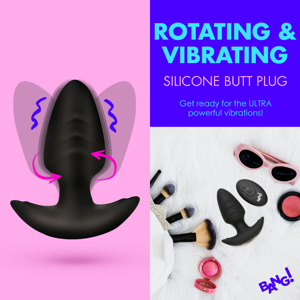 A black silicone anal plug with a remote control and makeup items.
