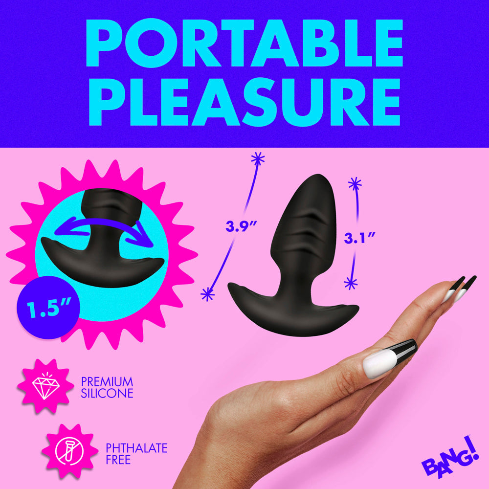 Black silicone anal plug with dimensions labeled.