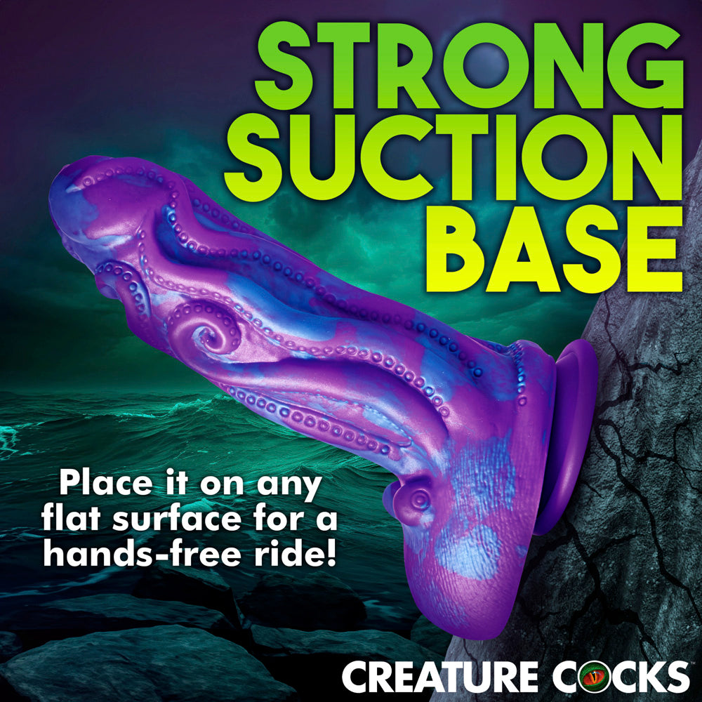 Purple octopus-shaped dildo with a suction cup base.