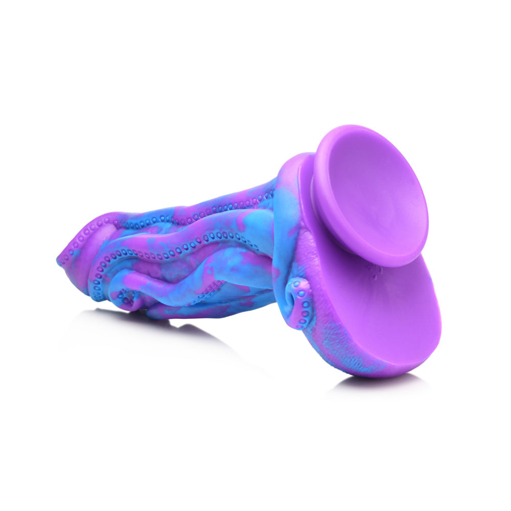 Purple and blue marbled octopus dildo with a suction cup base.