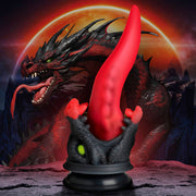 A red dragon dildo with a suction cup base and green eyes.
