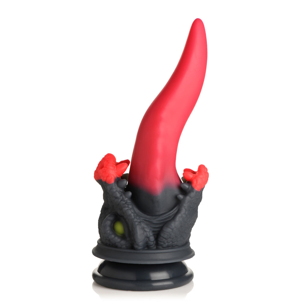Red and black dragon dildo with a suction cup base.