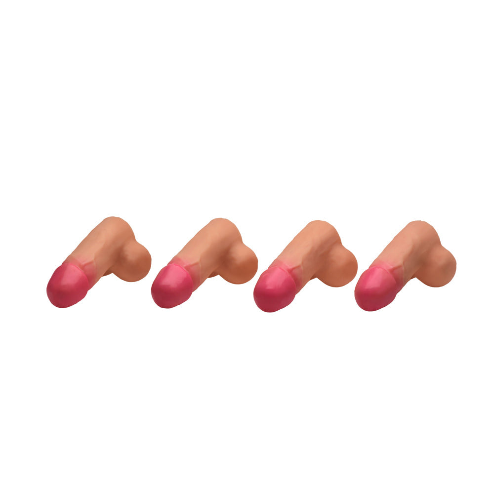 Four mini silicone dildos with pink tips arranged in a row.