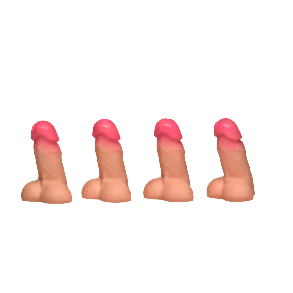 Four light pink magnetic mini silicone dildos standing upright on a white background.