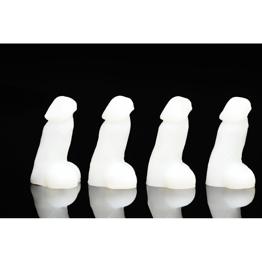 Four white, glow-in-the-dark mini silicone novelty dildos stand in a row.