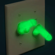 Glow-in-the-dark mini silicone novelty dildos attached to a light switch.