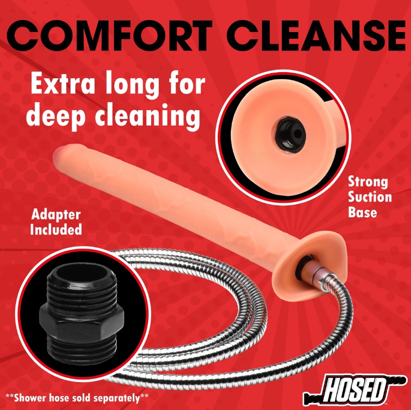 A peach-colored silicone enema hose attachment with a suction base and adapter.