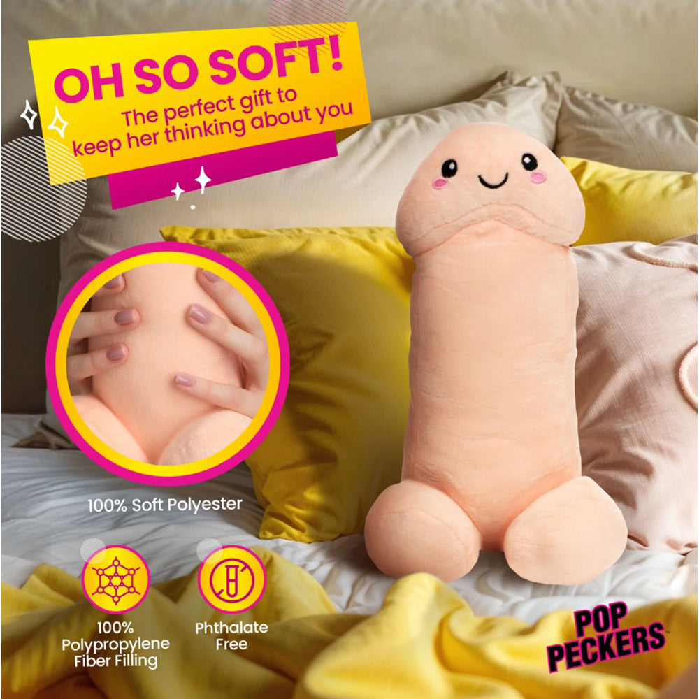 A soft, peach-colored plush penis pillow with a smiling face.