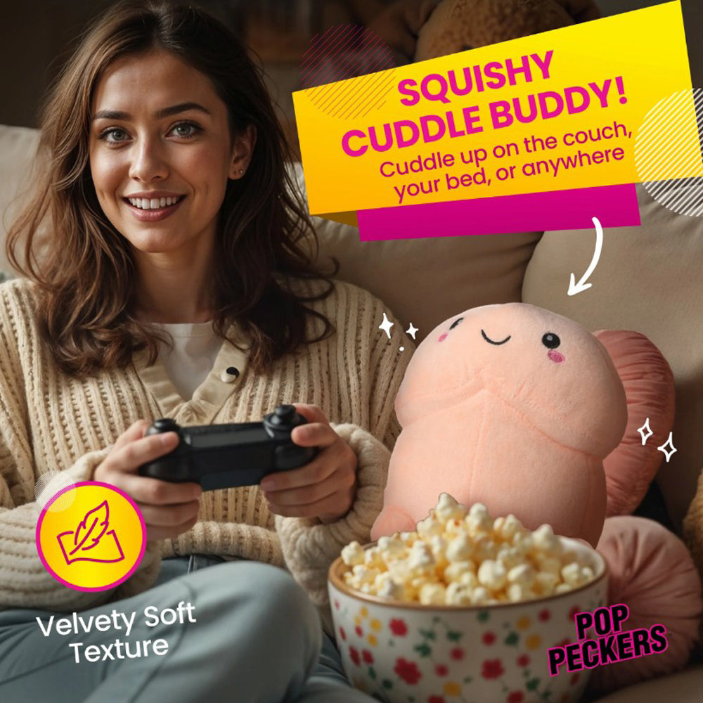 A woman plays video games with a plush pecker pillow and popcorn.