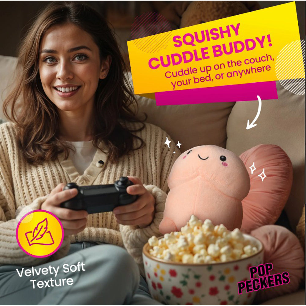 A woman plays a video game holding a controller, with a plush pillow and a bowl of popcorn nearby.