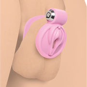 Pink feminizing vulva chastity cage with a silver ring.